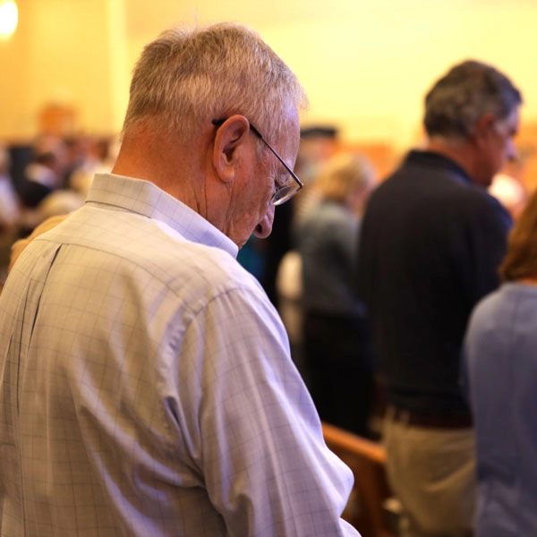 Man praying at church