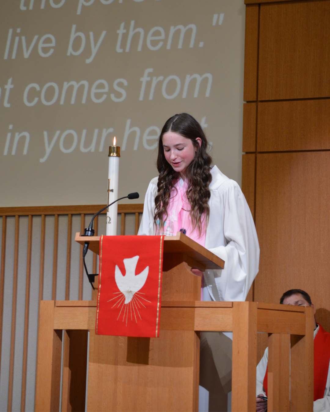 Person speaking at Confirmation Service.